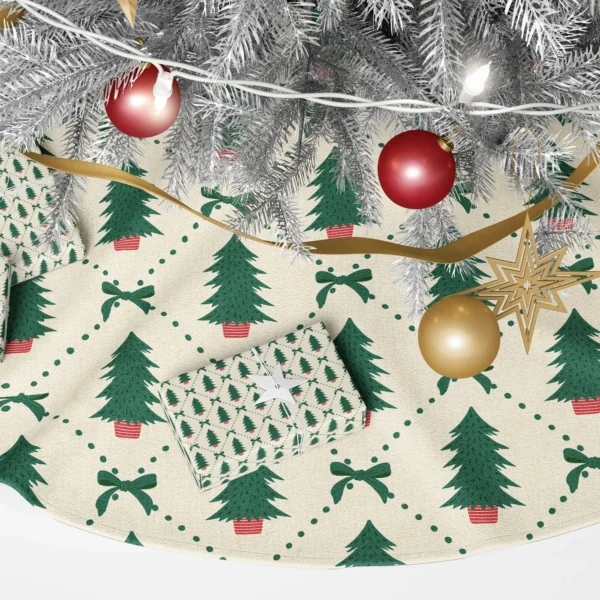 Close-up of a fir in a striped red pot inside a dotted green diamond with tiny bows
