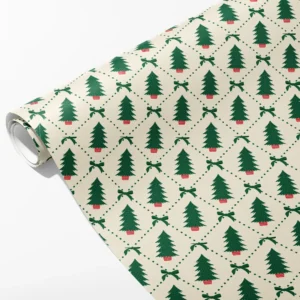 Roll of cream wrapping paper with green potted trees in a dotted green diamond lattice with small bows, partly unrolled