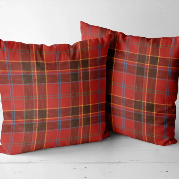 Two red and black block plaid throw pillows side by side