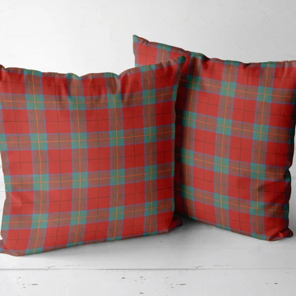 Two red and teal windowpane throw pillows side by side