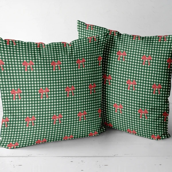 Two red bow gingham throw pillows side by side