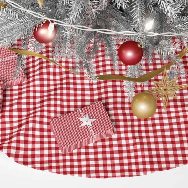 Close-up of the print: cherry-red squares, rosy stripes and white blocks in an even grid
