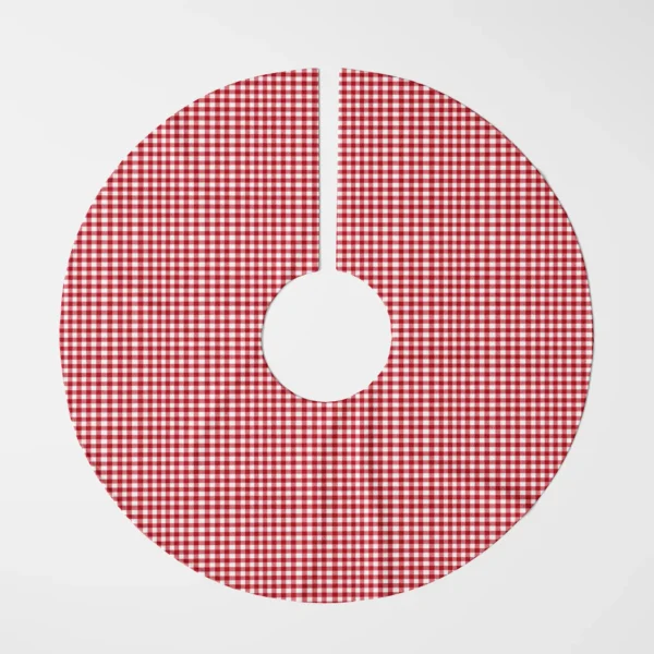 Red gingham tree skirt laid flat, top view on white, fine red and white check