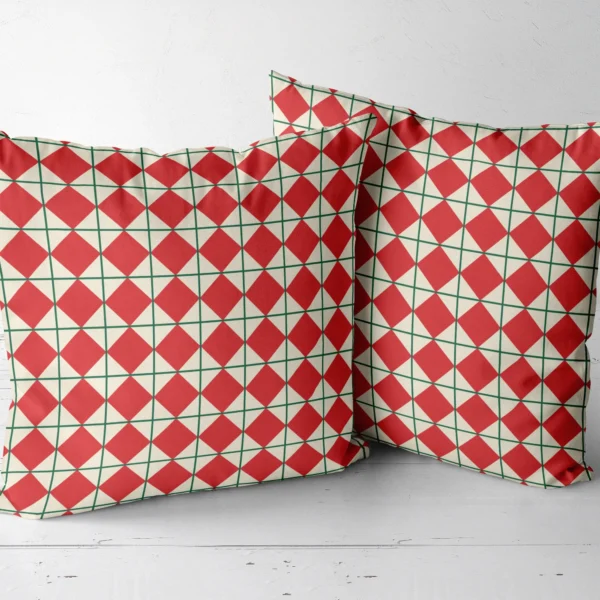 Pair of red harlequin throw pillows side by side
