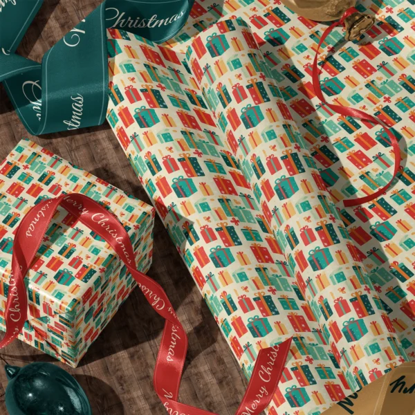 A sheet of retro present gift wrap and a wrapped box with satin ribbons on a wooden floor
