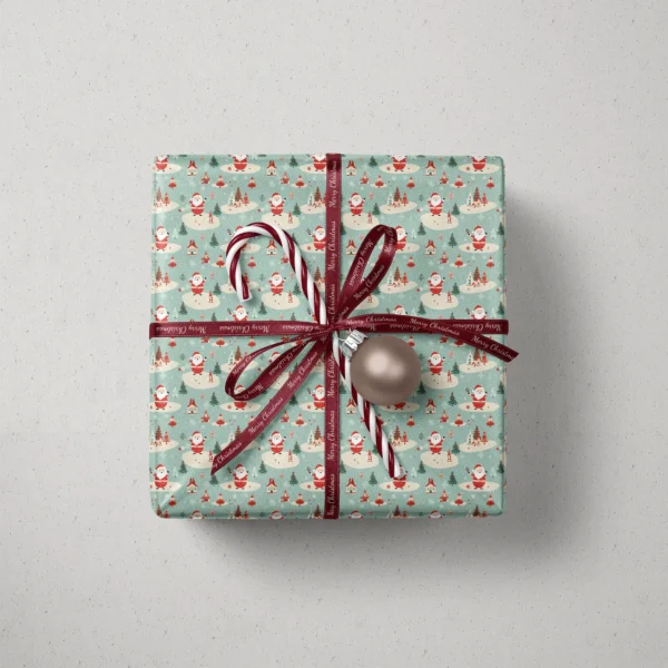 Top view of a gift in mint retro Santa paper with a ribbon, a candy cane and a bauble