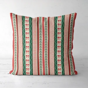 Ribbon stripe Christmas pillow, front view of bow, holly and dot bands
