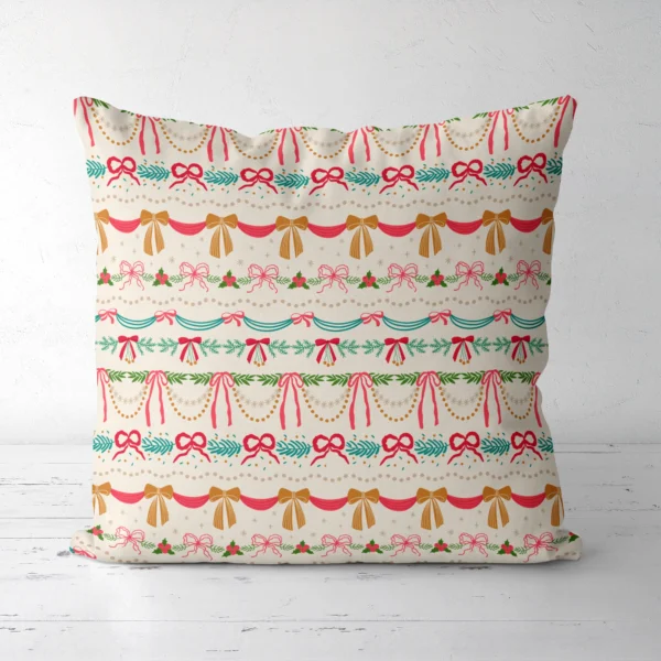 Ribbon swag Christmas pillow, front view, standing on a white floor