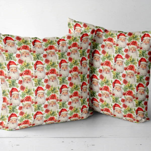 Pair of Santa and poinsettia throw pillows next to each other