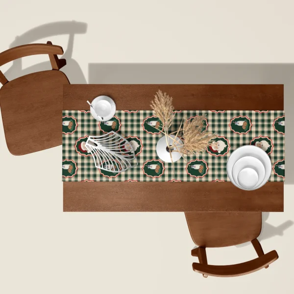 Santa milk and cookies Christmas table runner seen from above on a walnut table with white dishes and dried pampas