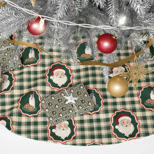 Close-up of a Santa medallion and a milk and cookies medallion on green gingham