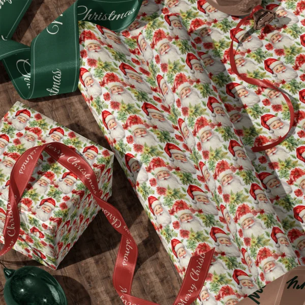 A sheet of Santa and poinsettia gift wrap and a wrapped box with satin ribbons on a wooden floor