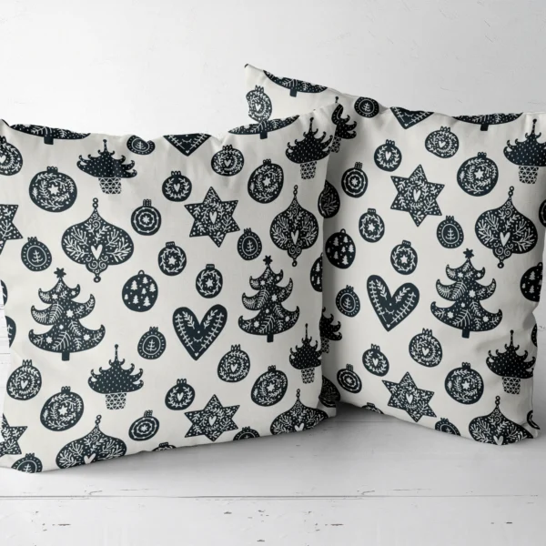 Two Scandi ornament throw pillows arranged together
