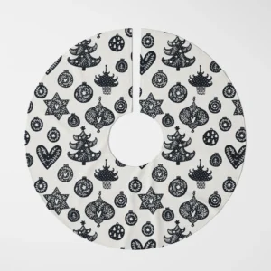 Scandi ornament tree skirt, black and cream, lying flat in a bird's-eye view on white