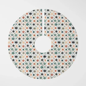 Scandi starburst tree skirt laid flat, top view on white, teal, rust and navy stars on off-white