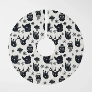Woodland animal skirt for the tree, black on cream, laid flat and shot from above on white