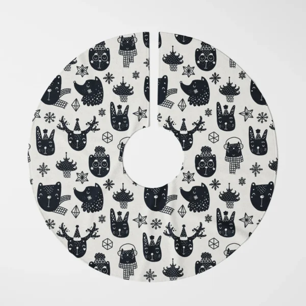 Woodland animal skirt for the tree, black on cream, laid flat and shot from above on white