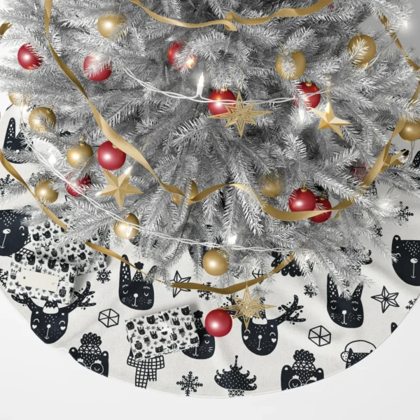 Scandi animal skirt under a lit tree with presents around the trunk