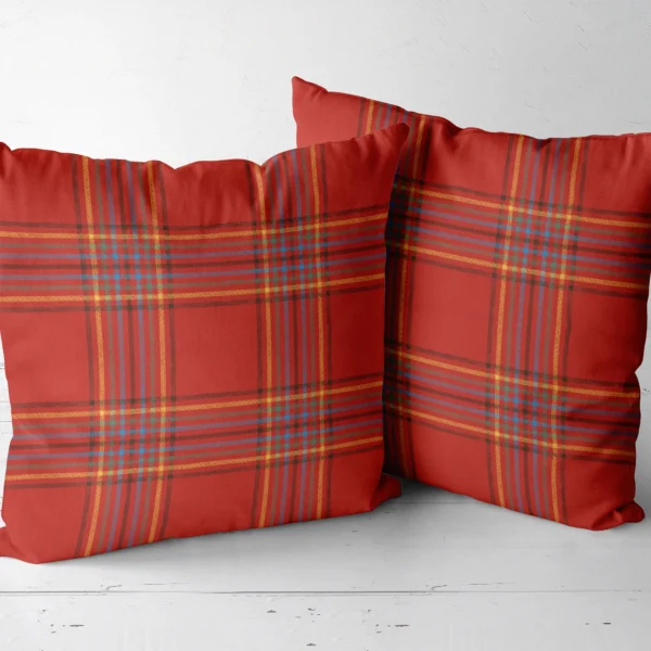 Two scarlet multi-stripe throw pillows side by side