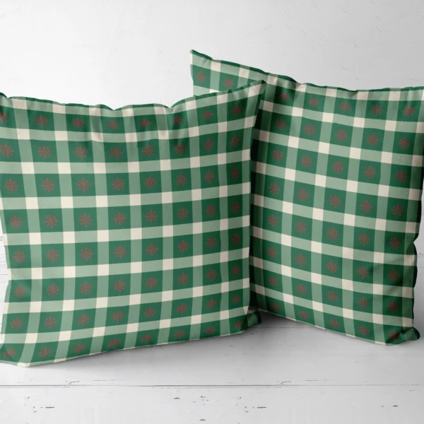 Two snowflake gingham pillows arranged side by side