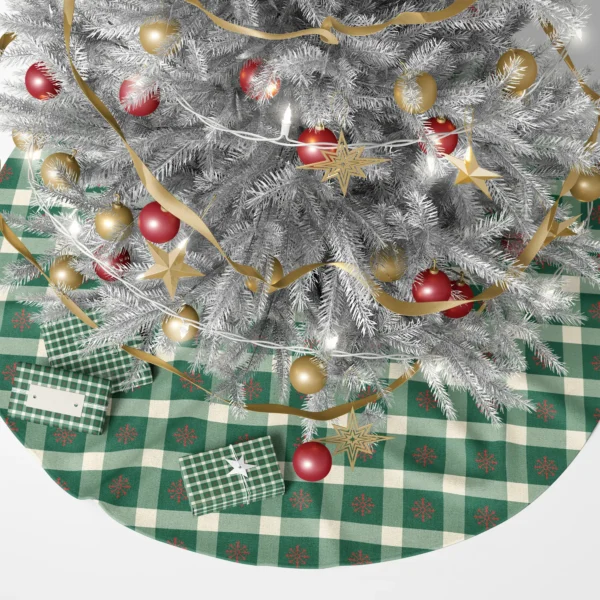 Cabin-style gingham tree skirt with red snowflakes under a lit tree and gifts