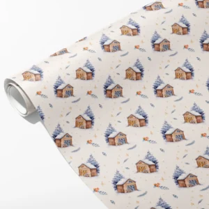 Roll of cream wrapping paper with watercolor snowy cabins, firewood stacks, firs and gold stars, partly unrolled on white