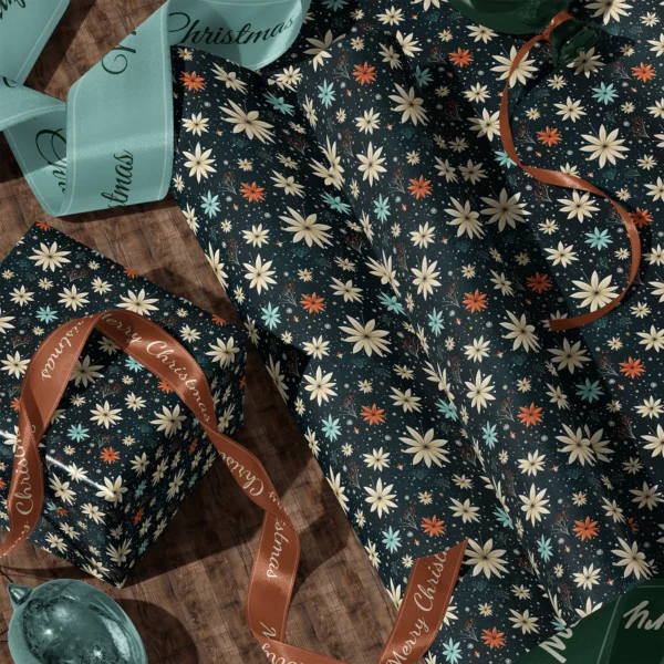 A sheet of midnight starflower gift wrap and a wrapped box with satin ribbons on a wooden floor