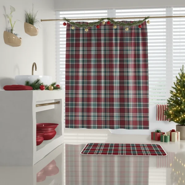Tartan Christmas shower curtain in a bright white bathroom with a lit tree, gifts and a matching mat
