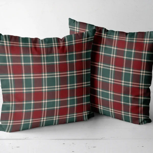 Two burgundy tartan throw pillows side by side
