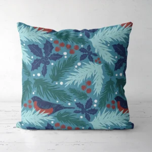 Teal bullfinch Christmas pillow on a white floor, front facing