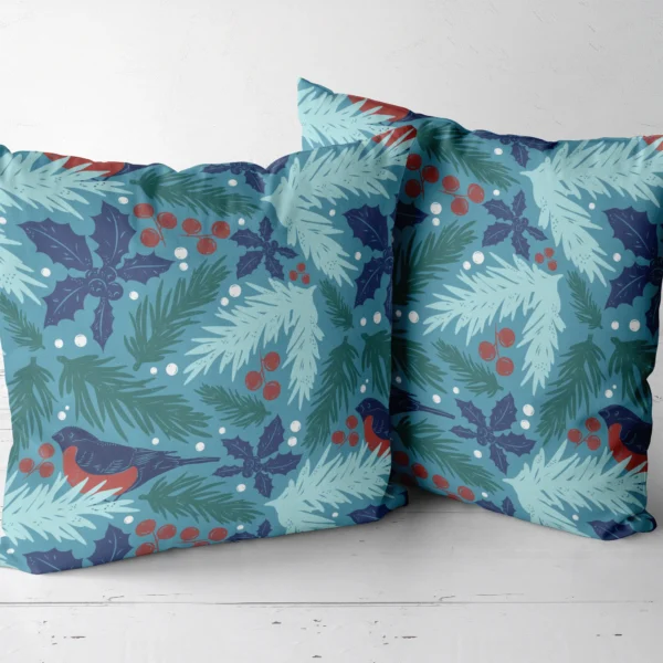 Pair of teal bullfinch throw pillows side by side