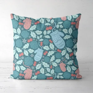Teal mitten Christmas pillow on a white floor, front facing