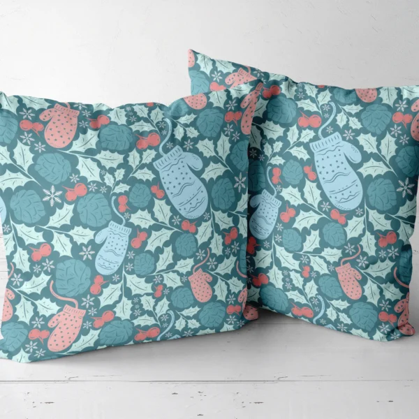 Pair of teal mitten throw pillows next to each other