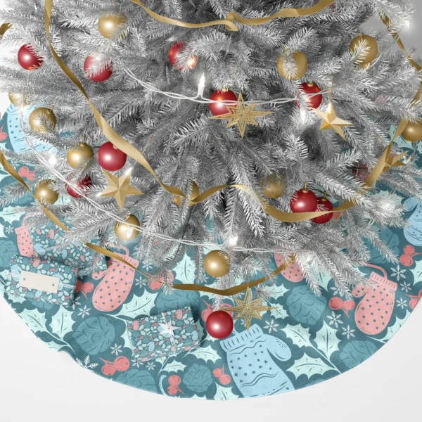 Teal mitten Christmas tree skirt under a glowing tree with gift boxes