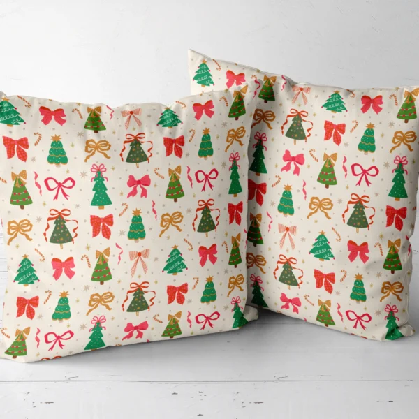 Pair of tree and bow throw pillows next to each other