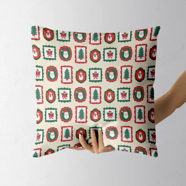 Hand holding the cream pillow with red and green scalloped frames