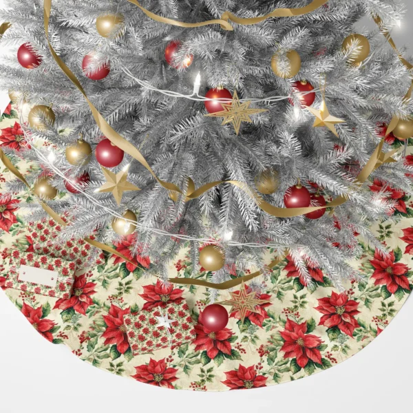 Poinsettia tree skirt beneath a lit Christmas tree with wrapped gifts