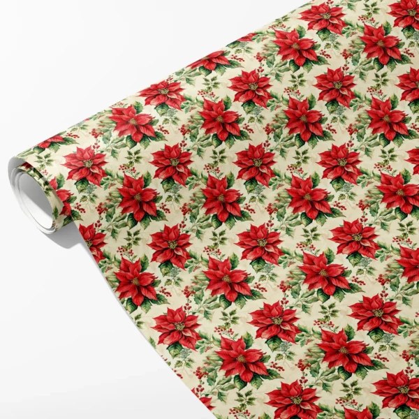 Roll of cream wrapping paper with large red poinsettias, holly leaves and red berries, partly unrolled on white