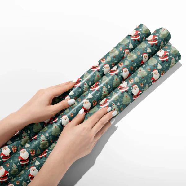 Hands smoothing three rolls of slate vintage Santa wrapping paper on a white table