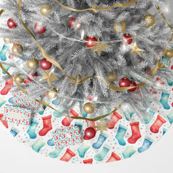 Watercolor stocking skirt under a lit tree with real wrapped boxes