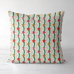 Wavy garland Christmas pillow, front view, standing on a white floor