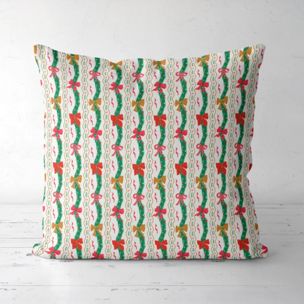Wavy garland Christmas pillow, front view, standing on a white floor