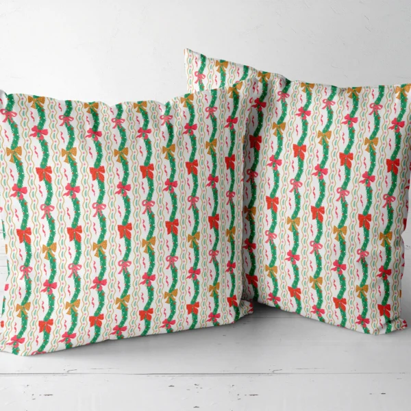 Two wavy garland throw pillows side by side